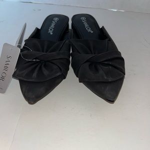 New black salimor mules size 6